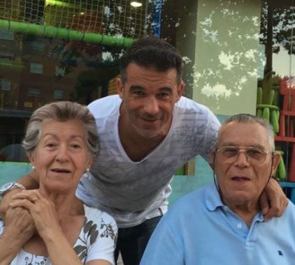 Luis Garcia Plaza with his parents.